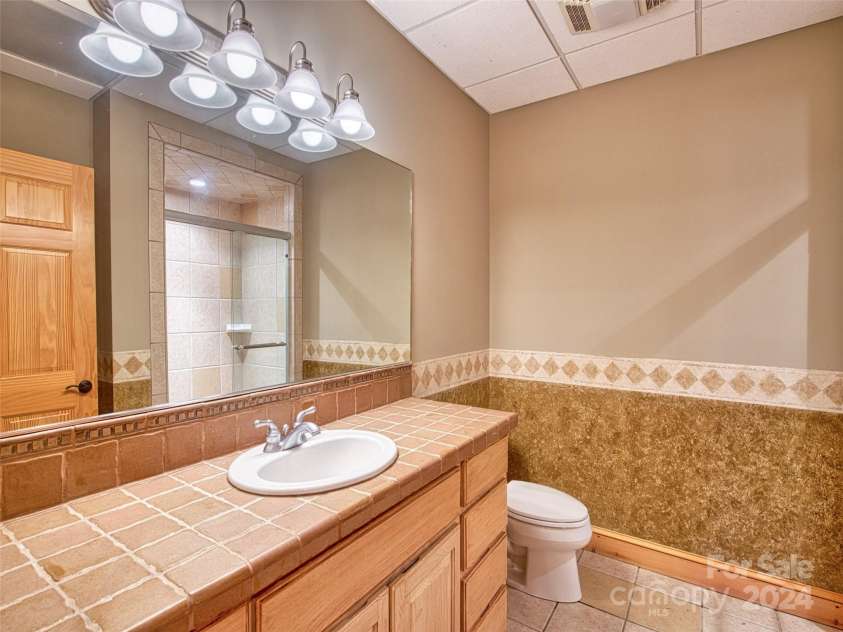 303 FLYING HAWK Road, Waynesville, NC 28786.  MLS# CAR4203494, YatesRealty ID 291. 