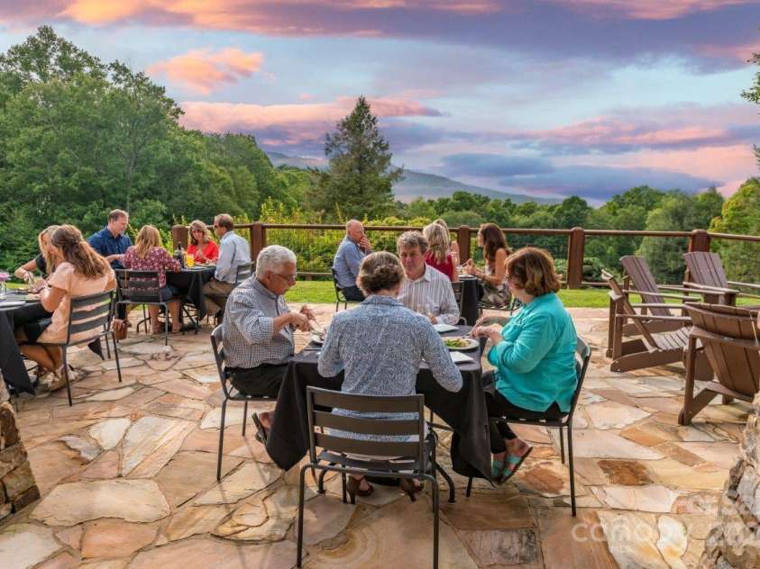 551 Macallan Drive, Waynesville, NC 28786.  MLS# CAR4305546, YatesRealty ID 291. Ascot Clubhouse  Outdoor Dining