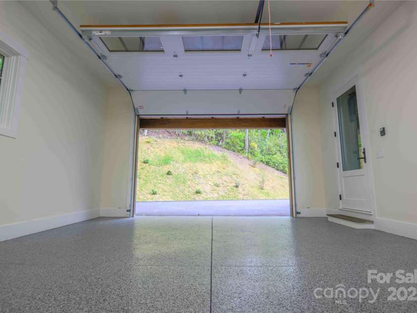 551 Macallan Drive, Waynesville, NC 28786.  MLS# CAR4305546, YatesRealty ID 291. Garage