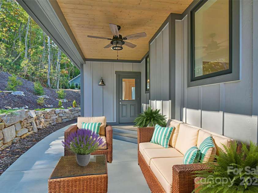 71 Crossings Circle, Fairview, NC 28730.  MLS# CAR4306682, YatesRealty ID 2910. Back Patio