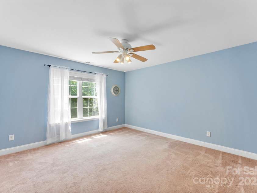 6300 Latta Springs Circle, Huntersville, NC 28078.  MLS# CAR4260746, YatesRealty ID 29101. Bedroom 5 next to primary suite