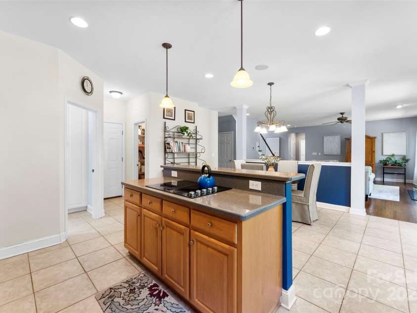 6300 Latta Springs Circle, Huntersville, NC 28078.  MLS# CAR4260746, YatesRealty ID 29101. Host guests with ease, cooktop island and bar seating