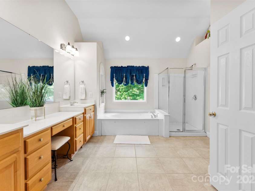 6300 Latta Springs Circle, Huntersville, NC 28078.  MLS# CAR4260746, YatesRealty ID 29101. Master bathroom with dual vanities