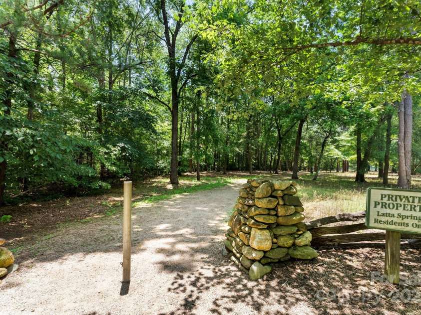 6300 Latta Springs Circle, Huntersville, NC 28078.  MLS# CAR4260746, YatesRealty ID 29101. Neighborhood walking trails