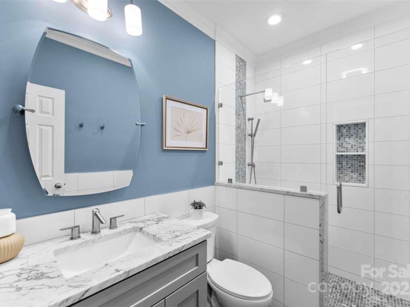 6300 Latta Springs Circle, Huntersville, NC 28078.  MLS# CAR4260746, YatesRealty ID 29101. Remodeled, accessible full bathroom on the first floor