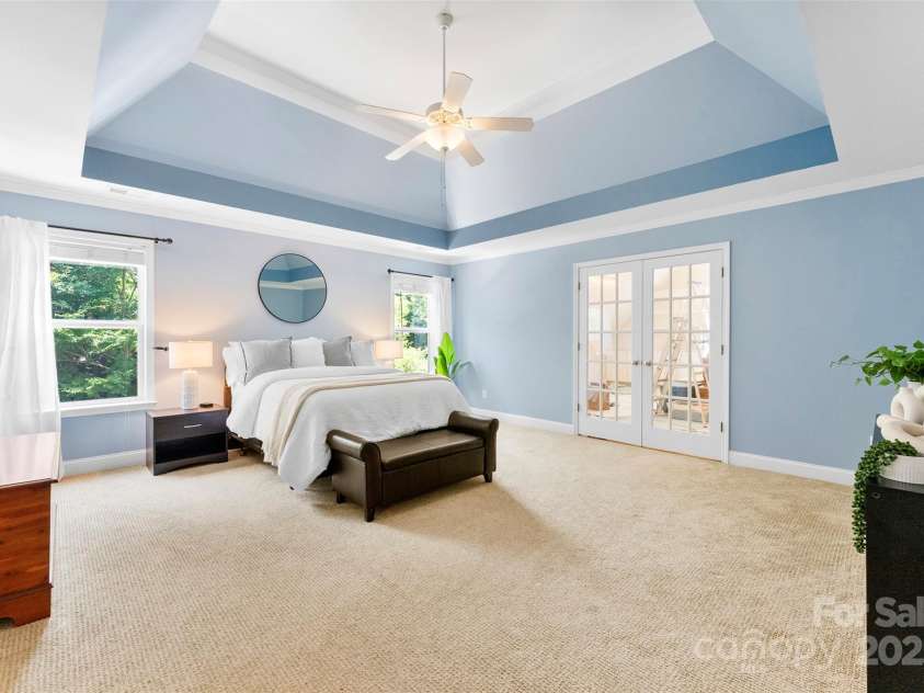 6300 Latta Springs Circle, Huntersville, NC 28078.  MLS# CAR4260746, YatesRealty ID 29101. Spacious primary suite with beautiful tray ceiling