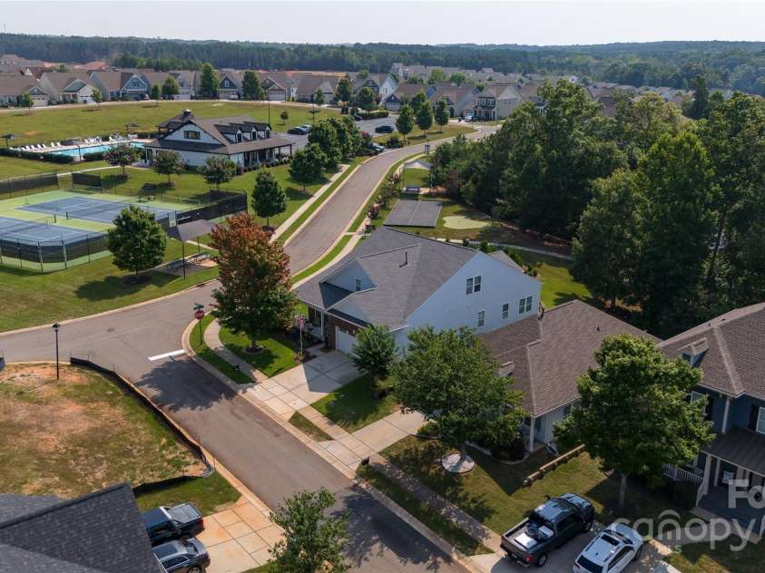 28111 Egrets Court, Lancaster, SC 29720.  MLS# CAR4277377, YatesRealty ID 29102. Home with pool and clubhouse aerial