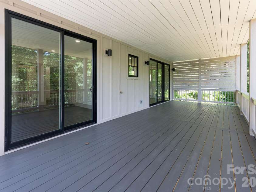 110 Unadilla Avenue, Asheville, NC 28803.  MLS# CAR4249602, YatesRealty ID 29105. Lower level covered deck