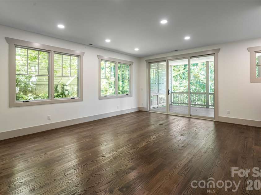 110 Unadilla Avenue, Asheville, NC 28803.  MLS# CAR4249602, YatesRealty ID 29105. Lower level family room