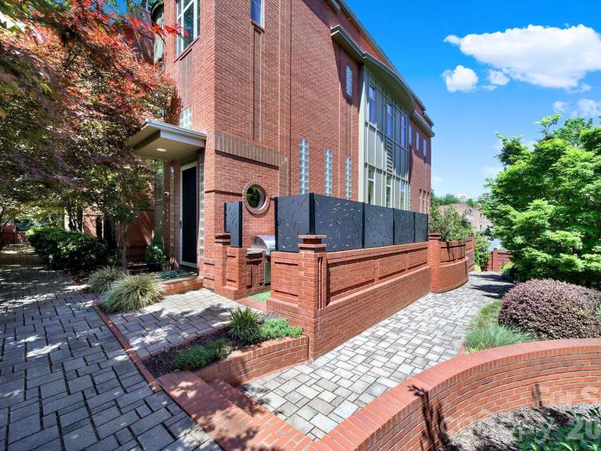 1930 Scott Avenue, Charlotte, NC 28203.  MLS# CAR4367127, YatesRealty ID 29105. Front entrance and private side terrace (not a shared space).