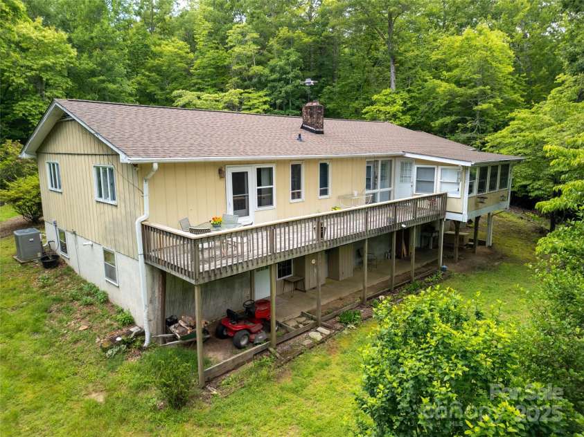 94 Sweetwater Lane, Pisgah Forest, NC 28768.  MLS# CAR4124609, YatesRealty ID 2911. Back of home