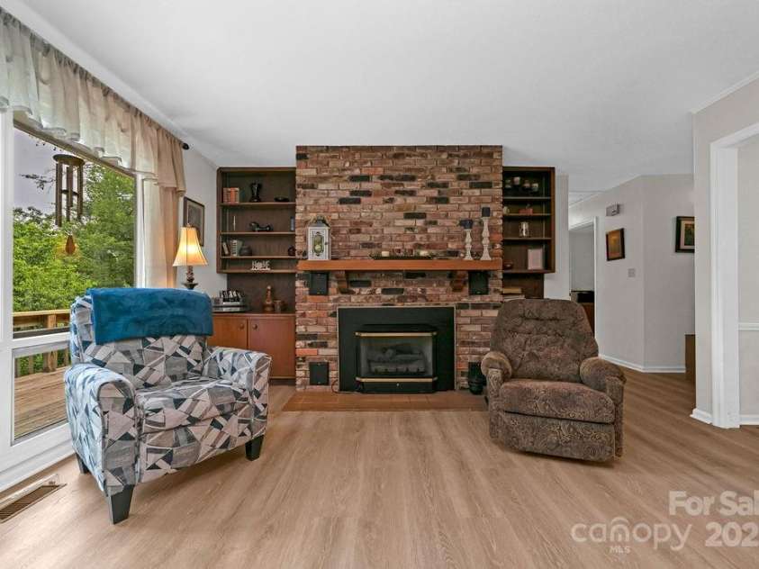 94 Sweetwater Lane, Pisgah Forest, NC 28768.  MLS# CAR4124609, YatesRealty ID 2911. Gas fireplace