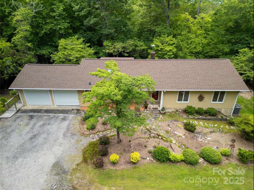 94 Sweetwater Lane, Pisgah Forest, NC 28768.  MLS# CAR4124609, YatesRealty ID 2911. Privacy Galore