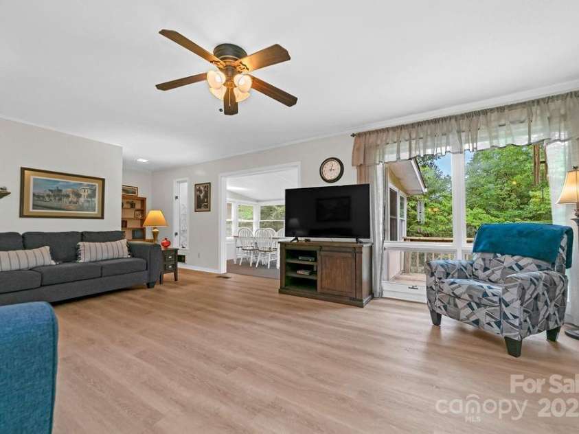 94 Sweetwater Lane, Pisgah Forest, NC 28768.  MLS# CAR4124609, YatesRealty ID 2911. Spacious living room