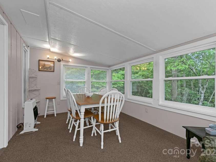94 Sweetwater Lane, Pisgah Forest, NC 28768.  MLS# CAR4124609, YatesRealty ID 2911. Surrounded by nature