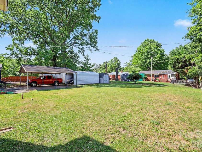 2240 Ashley Road, Charlotte, NC 28208.  MLS# CAR4373371, YatesRealty ID 29114. Backyard