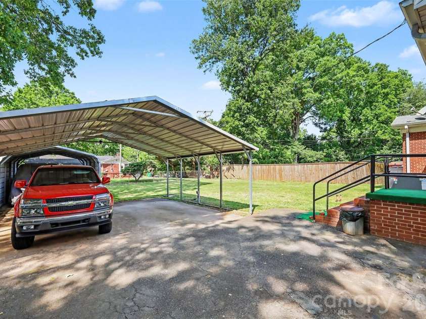 2240 Ashley Road, Charlotte, NC 28208.  MLS# CAR4373371, YatesRealty ID 29114. Carport/Shed/Driveway