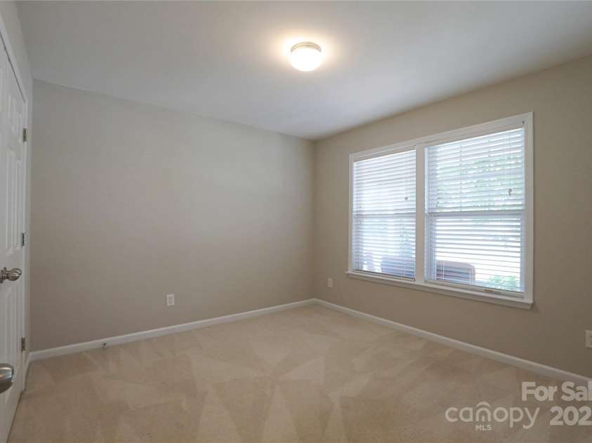 9814 Fernspray Road, Charlotte, NC 28215.  MLS# CAR4254340, YatesRealty ID 29114. Both secondary bedrooms offer a large double closet