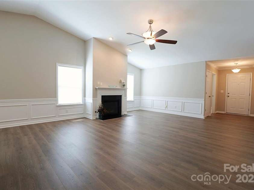 9814 Fernspray Road, Charlotte, NC 28215.  MLS# CAR4254340, YatesRealty ID 29114. Gas log fireplace and wainscoting