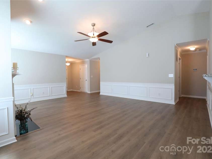 9814 Fernspray Road, Charlotte, NC 28215.  MLS# CAR4254340, YatesRealty ID 29114. Living room connects split bedroom plan