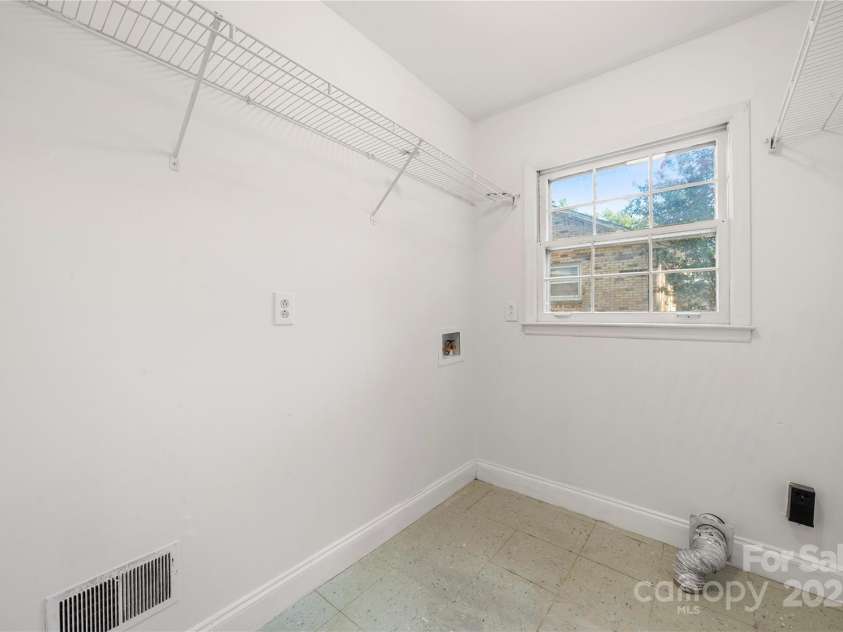 5115 Carriage Drive Circle, Charlotte, NC 28205.  MLS# CAR4283105, YatesRealty ID 29116. Laundry room