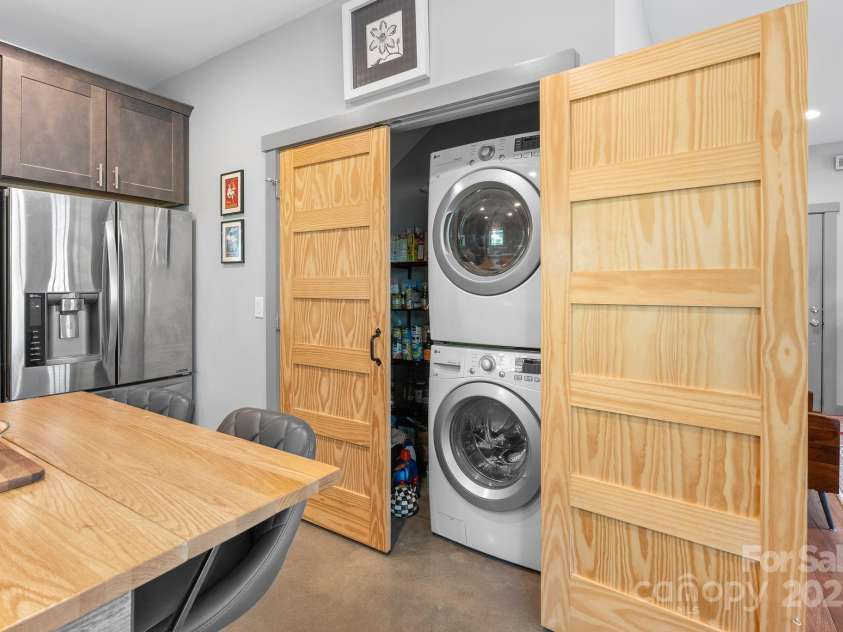 37 Bryant Street, Asheville, NC 28806.  MLS# CAR4332306, YatesRealty ID 29119. Laundry in Kitchen