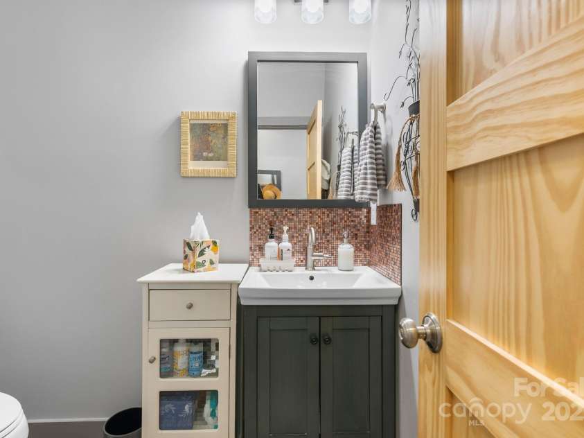 37 Bryant Street, Asheville, NC 28806.  MLS# CAR4332306, YatesRealty ID 29119. Powder Room on Main Level 