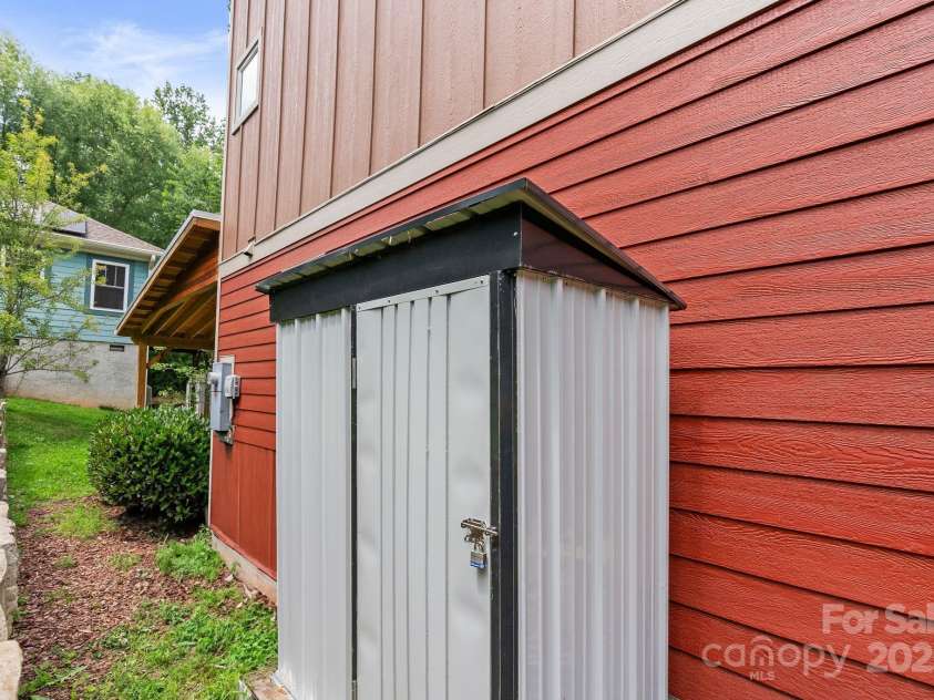 37 Bryant Street, Asheville, NC 28806.  MLS# CAR4332306, YatesRealty ID 29119. Storage Shed in Rear