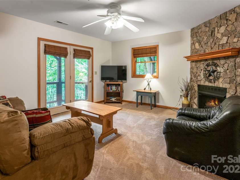 380 Allison Drive, Maggie Valley, NC 28751.  MLS# CAR4273769, YatesRealty ID 29120. Downstairs living room
