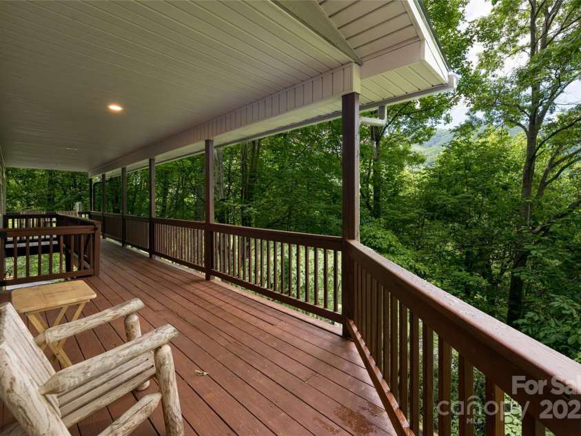 380 Allison Drive, Maggie Valley, NC 28751.  MLS# CAR4273769, YatesRealty ID 29120. Front deck off great room