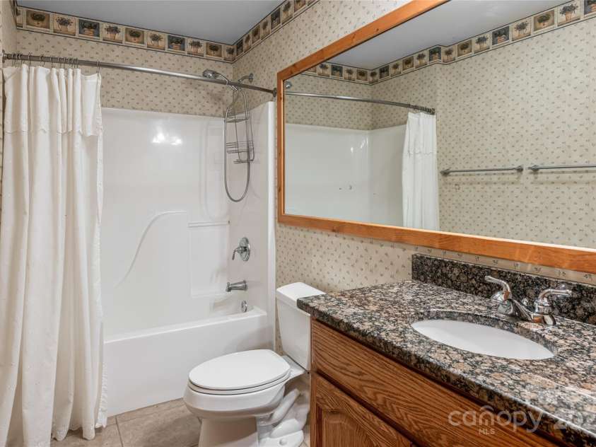 380 Allison Drive, Maggie Valley, NC 28751.  MLS# CAR4273769, YatesRealty ID 29120. Full bath on lower level