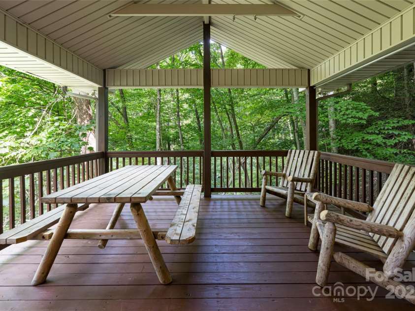 380 Allison Drive, Maggie Valley, NC 28751.  MLS# CAR4273769, YatesRealty ID 29120. Side deck off great room