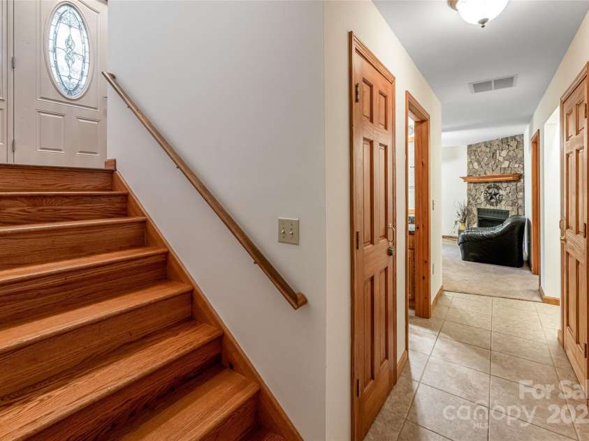 380 Allison Drive, Maggie Valley, NC 28751.  MLS# CAR4273769, YatesRealty ID 29120. Split staircase to lower level
