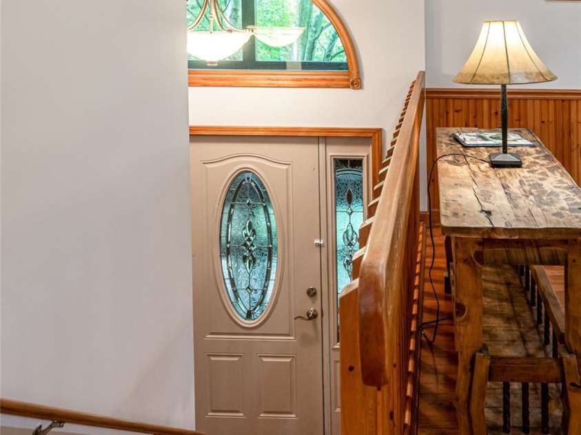 380 Allison Drive, Maggie Valley, NC 28751.  MLS# CAR4273769, YatesRealty ID 29120. Split staircase to upper level