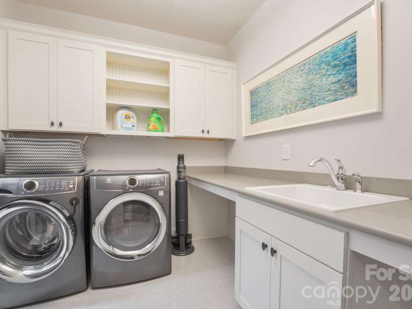 4315 Calvet Court, Charlotte, NC 28210.  MLS# CAR4372498, YatesRealty ID 29122. Laundry with dual entrance (primary and hall) 