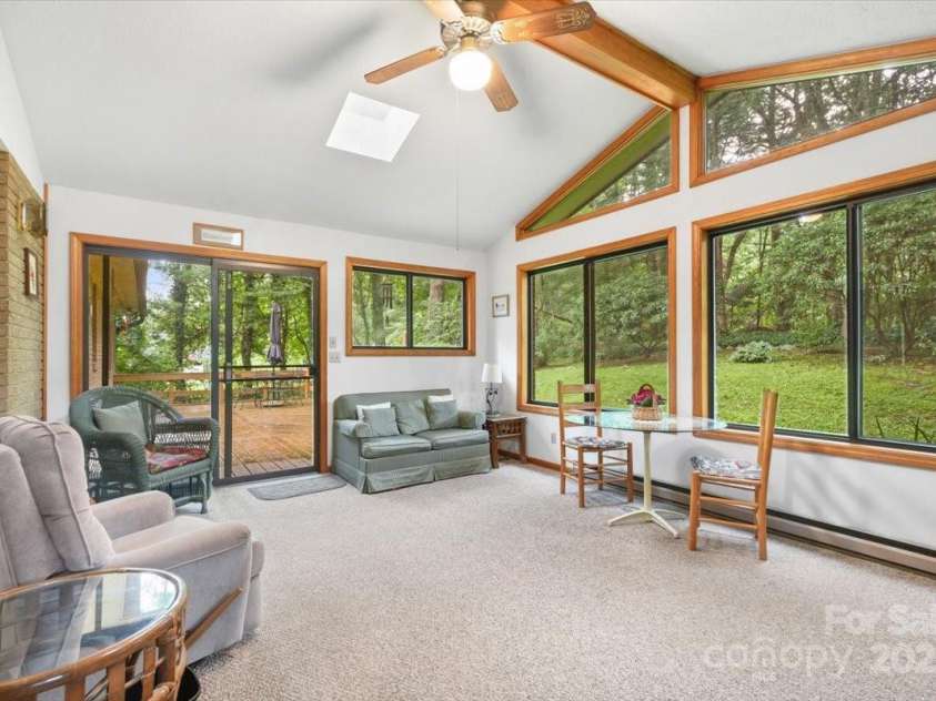 111 Cannon Drive, Hendersonville, NC 28792.  MLS# CAR4278342, YatesRealty ID 29128. Sunroom
