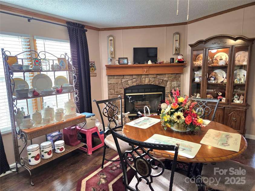 1168 Love Valley Road, Clover, SC 29710.  MLS# CAR4326745, YatesRealty ID 2913. Den w FP