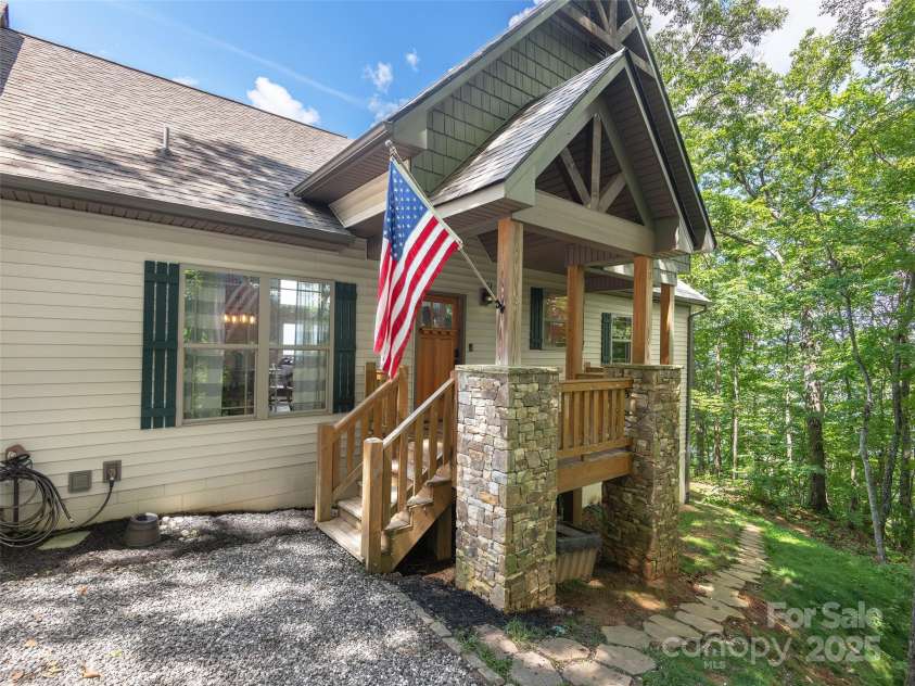 1070 Gold City Lane, Franklin, NC 28734.  MLS# CAR4282550, YatesRealty ID 29132. Welcome home to rustic charm and timeless curb appeal—your mountain retreat starts right at the front door.