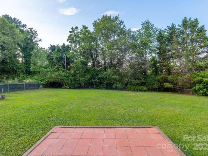 101 Hillsdale Lane, Taylorsville, NC 28681.  MLS# CAR4277637, YatesRealty ID 29135. Backyard with paver patio area