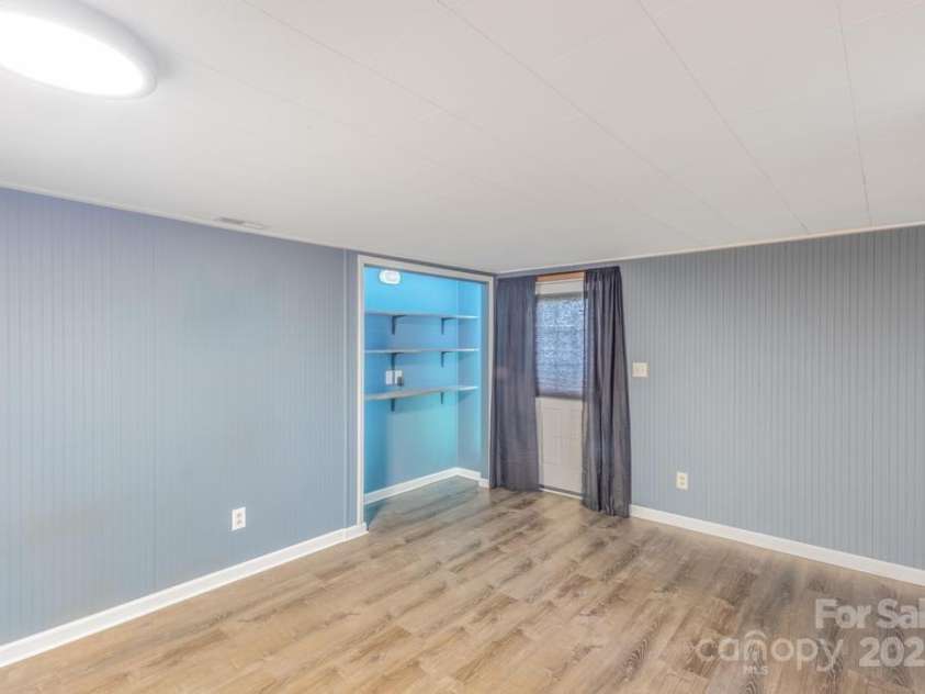 101 Hillsdale Lane, Taylorsville, NC 28681.  MLS# CAR4277637, YatesRealty ID 29135. Basement Den Area