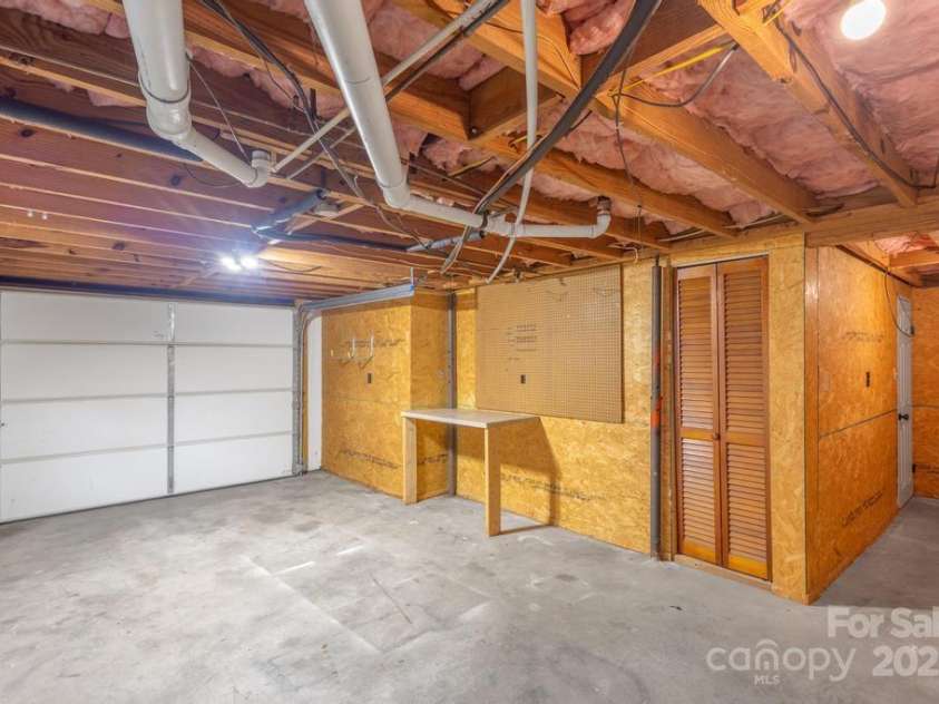 101 Hillsdale Lane, Taylorsville, NC 28681.  MLS# CAR4277637, YatesRealty ID 29135. Basement Level Garage Area