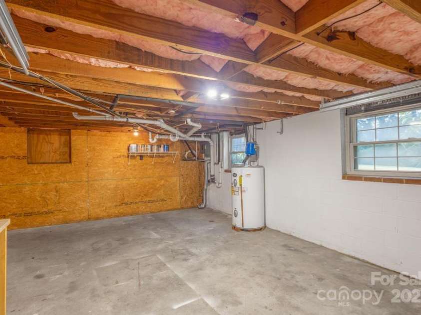 101 Hillsdale Lane, Taylorsville, NC 28681.  MLS# CAR4277637, YatesRealty ID 29135. Basement level Garage Area