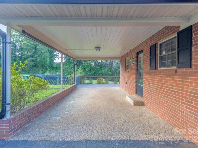 101 Hillsdale Lane, Taylorsville, NC 28681.  MLS# CAR4277637, YatesRealty ID 29135. Carport/ Side of home