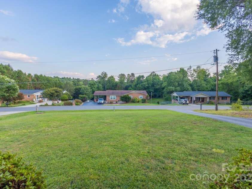 101 Hillsdale Lane, Taylorsville, NC 28681.  MLS# CAR4277637, YatesRealty ID 29135. Front yard of the home