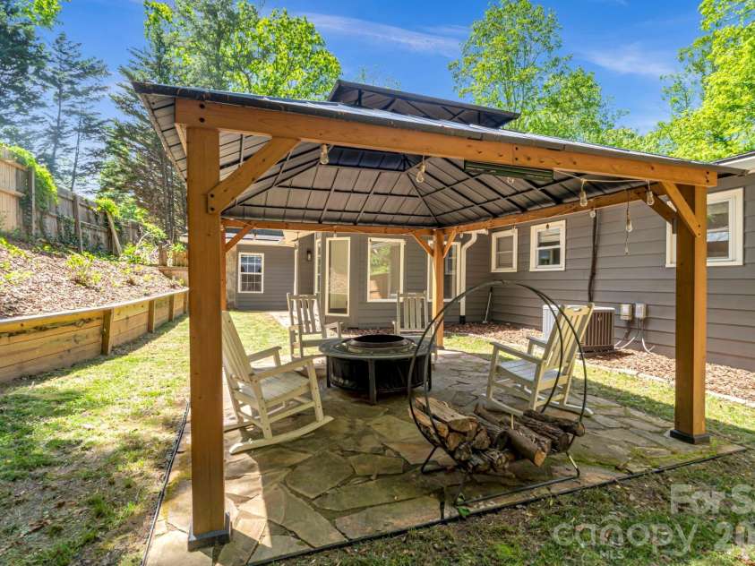 35 Timberview Drive, Arden, NC 28704.  MLS# CAR4373385, YatesRealty ID 29135. A charming setting for outdoor dining, celebrations, or peaceful afternoons.