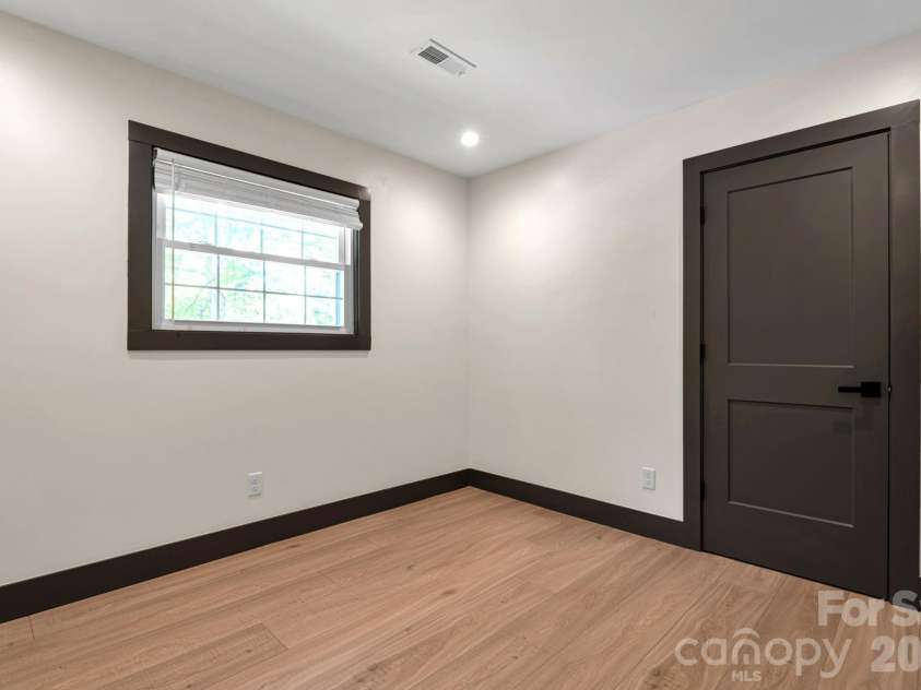 35 Timberview Drive, Arden, NC 28704.  MLS# CAR4373385, YatesRealty ID 29135. A light-filled third bedroom