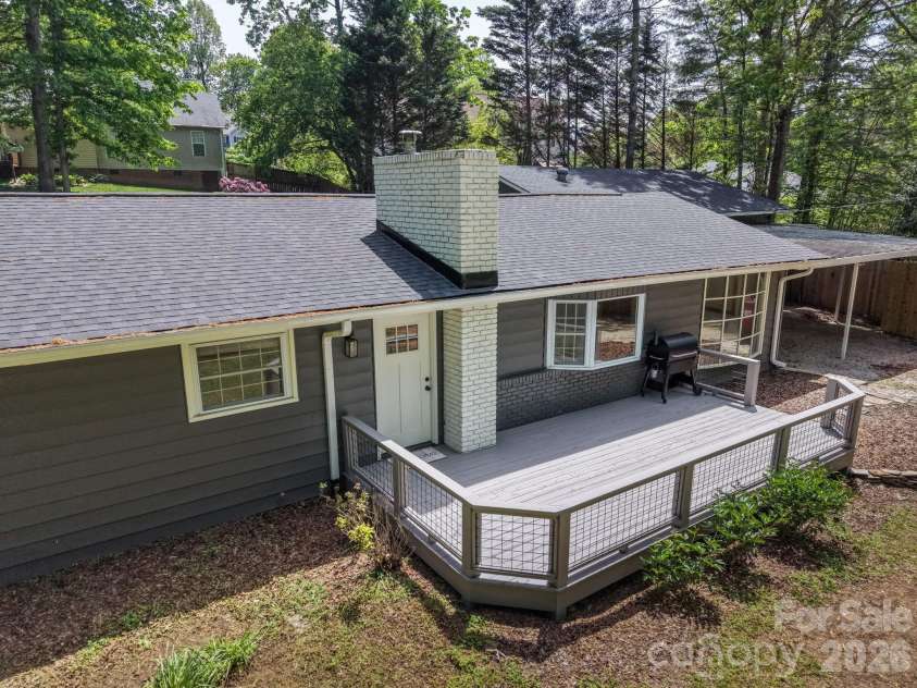 35 Timberview Drive, Arden, NC 28704.  MLS# CAR4373385, YatesRealty ID 29135. A welcoming front entrance paired with a spacious deck