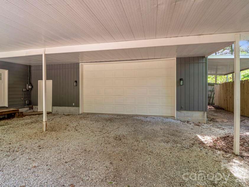 35 Timberview Drive, Arden, NC 28704.  MLS# CAR4373385, YatesRealty ID 29135. Approximately 830 sq ft of garage space ideal for storage, hobbies, or a workshop.