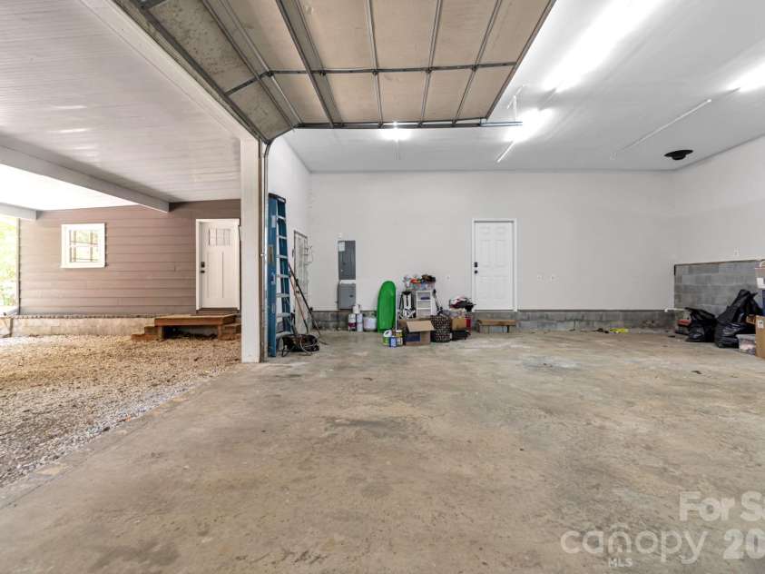35 Timberview Drive, Arden, NC 28704.  MLS# CAR4373385, YatesRealty ID 29135. Expansive garage space ready to fit your needs.