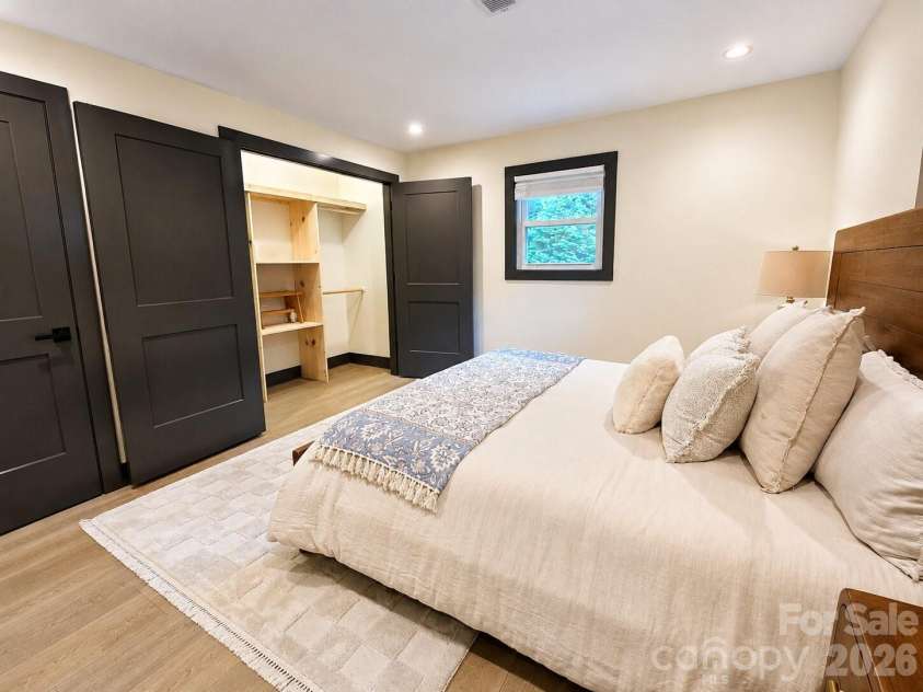 35 Timberview Drive, Arden, NC 28704.  MLS# CAR4373385, YatesRealty ID 29135. Large closet with built-in shelving